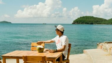 solo traveler sitting seaside